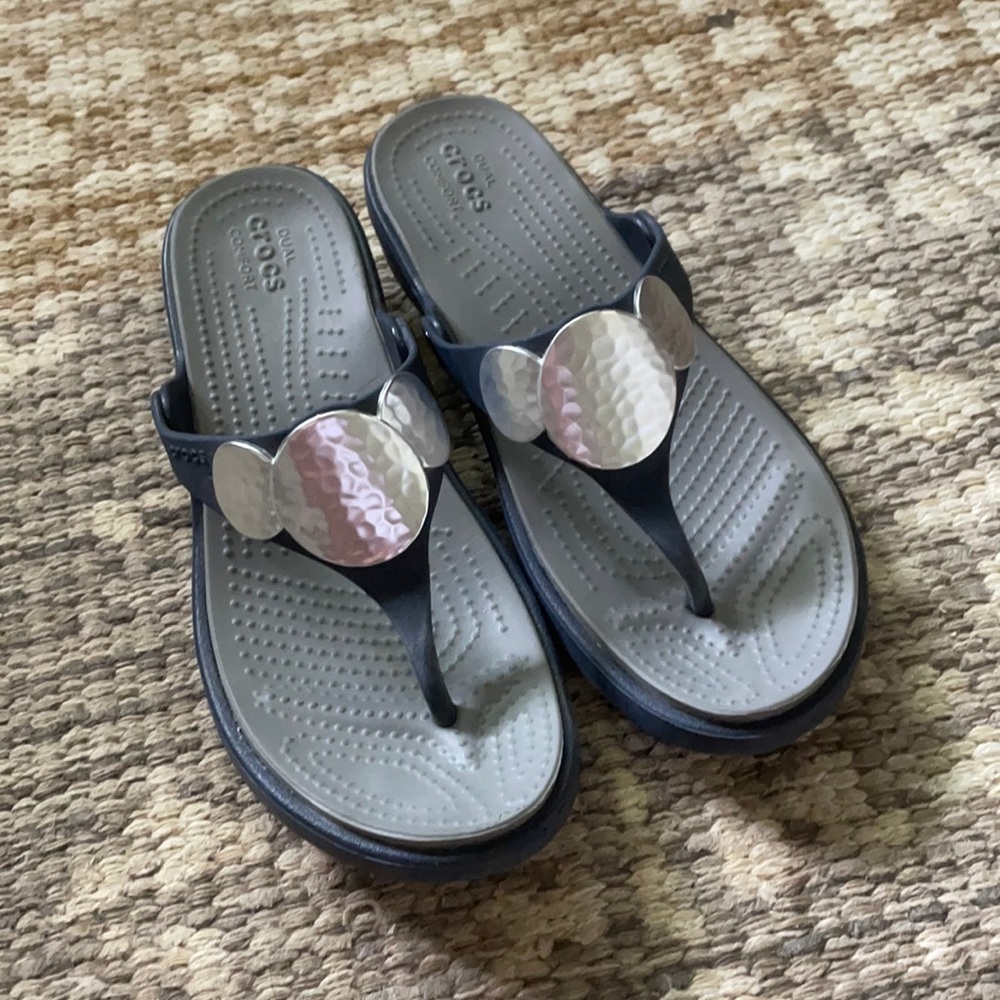 Crocs flip flops with silver detail